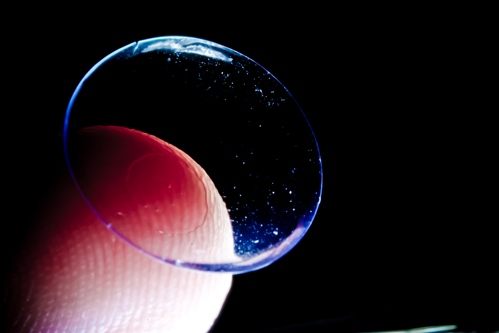 contact lens on finger